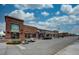 Daytime street view of a commercial district, with local business such as Jimmy John's at 195 S Sable Blvd # U12, Aurora, CO 80012