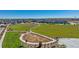 Overhead view of community green space with walking paths and outdoor area nestled in neighborhood at 9882 Cathay St, Commerce City, CO 80022