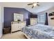 Charming bedroom with vaulted ceiling, contemporary furnishings, a large window, and generous natural light at 13255 Holly St # B, Thornton, CO 80241