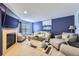 Cozy living room with a fireplace, comfortable seating, and a modern aesthetic at 13255 Holly St # B, Thornton, CO 80241