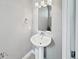 Stylish half-bathroom with sleek countertops and modern fixtures at 1245 Utica St # 104, Denver, CO 80204