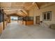 Large, open stable features horse stalls and an open-air entrance for horses at 37653 Lark Dr, Elizabeth, CO 80107
