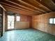 Spacious unfinished basement, showcasing exposed beams and unique floors awaiting your creative vision at 10440 Gilpin St, Northglenn, CO 80233