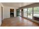 Inviting living room with hardwood floors, and a view to the front yard at 10440 Gilpin St, Northglenn, CO 80233