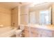 Full bathroom with a bathtub, shower, toilet, and vanity with sink and large mirror at 14300 Waterside Ln # L5, Broomfield, CO 80023
