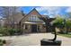 Beautiful clubhouse with unique statue, well-manicured landscaping and a welcoming entrance at 14300 Waterside Ln # L5, Broomfield, CO 80023