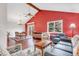 Spacious living room with hardwood floors, vaulted ceiling, and large window providing plenty of natural light at 7284 Dry Creek Rd, Niwot, CO 80503