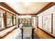 Dining room with hardwood floors, wood trim, and a stylish chandelier at 843 Adams St, Denver, CO 80206
