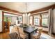 Dining room featuring hardwood floors, black table and natural light at 843 Adams St, Denver, CO 80206