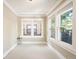 An empty room featuring neutral paint, carpet flooring and many windows that offer lots of natural light at 843 Adams St, Denver, CO 80206
