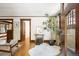 Open entryway features hardwood floors, natural light, and elegant decor at 843 Adams St, Denver, CO 80206