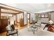 Spacious living room featuring hardwood floors, trim, and abundant natural light at 843 Adams St, Denver, CO 80206