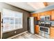 Bright kitchen with stainless steel appliances and a large window at 9576 Deerhorn Ct # 50, Parker, CO 80134