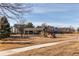 Community playground featuring play structures, covered picnic area, and inviting walking paths at 9576 Deerhorn Ct # 50, Parker, CO 80134