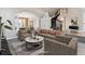 Elegant living room showcasing neutral tones, staircase and sophisticated furnishings at 1328 Double Eagle Ct, Castle Rock, CO 80104