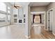 Bright and airy living room featuring a fireplace and hardwood flooring at 1328 Double Eagle Ct, Castle Rock, CO 80104