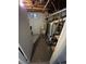 A clean utility area with water heater and HVAC equipment at 387 Tucson St, Aurora, CO 80011
