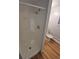 Bathroom featuring a step-in shower with new floors and paint at 387 Tucson St, Aurora, CO 80011