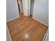 Cozy bedroom boasts beautiful hardwood floors and ample closet space at 387 Tucson St, Aurora, CO 80011