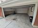 Open garage with concrete floors at 387 Tucson St, Aurora, CO 80011