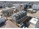 Aerial view of modern townhomes, highlighting their location within a vibrant neighborhood at 2140 S Ash St # 101, Denver, CO 80222
