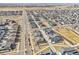 A birds eye view of a quiet neighborhood featuring modern homes, sidewalks, and roadways at 21411 E 60Th Ave, Aurora, CO 80019