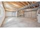 Unfinished basement space showing concrete floor, exposed beams and unfinished walls at 21411 E 60Th Ave, Aurora, CO 80019