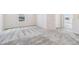 Bright bedroom with neutral carpet, white trim, and ample natural light at 21411 E 60Th Ave, Aurora, CO 80019