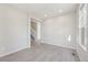 Inviting living area with staircase, modern floors, and natural light at 21411 E 60Th Ave, Aurora, CO 80019