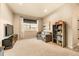 Comfortable living area featuring neutral tones, plush seating, and ample natural light at 8378 Arapahoe Peak St, Littleton, CO 80125