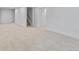 Spacious basement with neutral carpet, white walls, and staircase, offering flexibility at 4650 S Idalia St, Aurora, CO 80015
