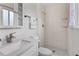 Updated bathroom with stylish vanity and tiled shower featuring neutral design at 4650 S Idalia St, Aurora, CO 80015