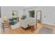 Bright living room featuring hardwood floors and contemporary furniture at 4650 S Idalia St, Aurora, CO 80015