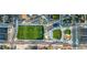 An aerial view of park and recreation facilities, including a green sports field and play areas at 4648 Josephine St, Denver, CO 80216