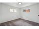 Bedroom with carpet and windows at 1330 Oak Pl, Thornton, CO 80229