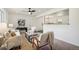 Sunlit living room with neutral colors, stylish furniture, and modern decor is perfect for relaxing or entertaining at 1330 Oak Pl, Thornton, CO 80229
