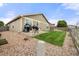 Well-maintained backyard with a concrete patio perfect for outdoor entertaining and grilling at 848 Sagebrush Dr, Brighton, CO 80603