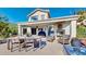 Expansive deck with dining, lounge area, hot tub, fireplace and amazing views of the natural mountain landscape at 2602 Hidden Valley Road, Sedalia, CO 80135
