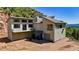 Spacious home exterior featuring a driveway and mountain views at 2602 Hidden Valley Road, Sedalia, CO 80135