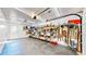 Spacious garage with built-in shelving, providing plenty of storage and organization solutions at 2602 Hidden Valley Road, Sedalia, CO 80135