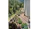 Exterior view of the garden with beautiful colorful flowers and lush foliage on a hillside at 2602 Hidden Valley Road, Sedalia, CO 80135