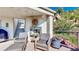 Cozy patio with an outdoor fireplace and comfortable seating, perfect for relaxing and enjoying the scenery at 2602 Hidden Valley Road, Sedalia, CO 80135