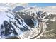 A stunning aerial view of a snow-covered mountain at 1520 Virginia St, Idaho Springs, CO 80452