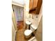 Cozy bathroom featuring a toilet, sink, and vanity at 1520 Virginia St, Idaho Springs, CO 80452