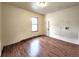Spare bedroom with hardwood-look flooring and natural light at 1520 Virginia St, Idaho Springs, CO 80452