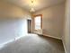 Modest bedroom with hardwood-look flooring and classic light fixture at 1520 Virginia St, Idaho Springs, CO 80452