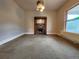 Spacious living room with vintage fireplace and fixture at 1520 Virginia St, Idaho Springs, CO 80452
