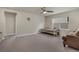 Spacious bonus room with natural light and a ceiling fan, offering versatile possibilities at 9836 Banner Peak St, Littleton, CO 80125