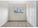 Cozy bedroom with neutral carpet, crisp white paint and a large window for great natural light at 873 Mockingbird St, Brighton, CO 80601