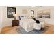 Main bedroom boasts natural light, hardwood floors, and neutral-toned walls at 2610 N Monroe St, Denver, CO 80205
